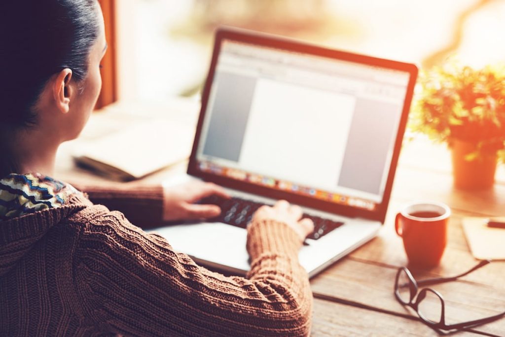 woman writer on lap top